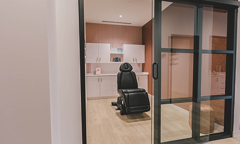 Modern beauty treatment room with a chair.